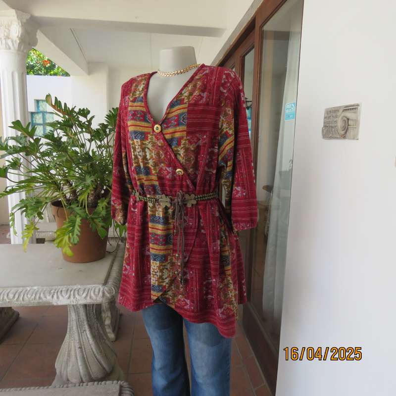 Warm peplum style stretch polyester crimson red geometric print top size 40 to 42.