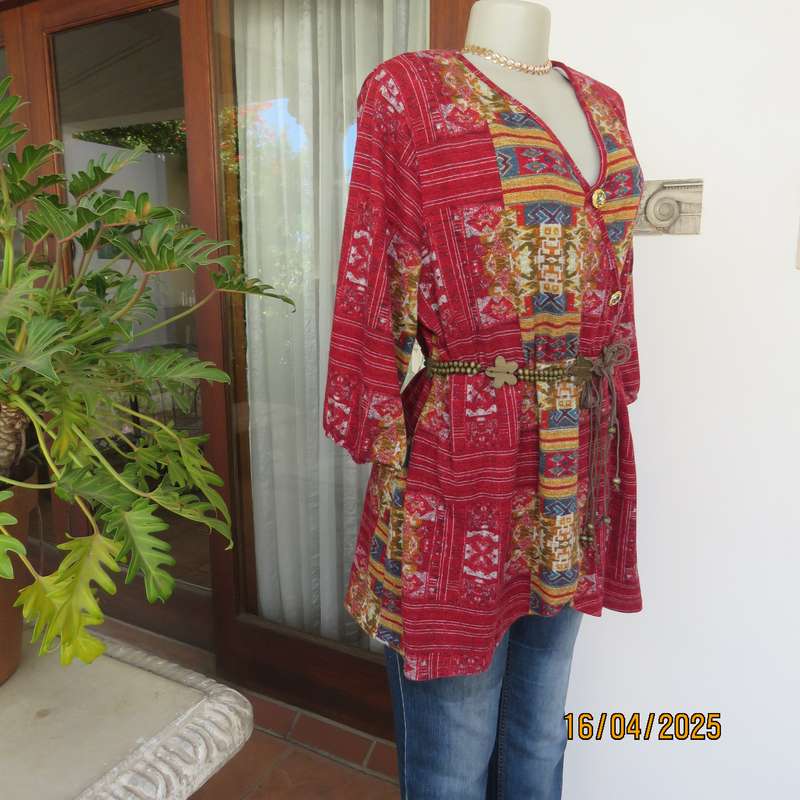 Warm peplum style stretch polyester crimson red geometric print top size 40 to 42.