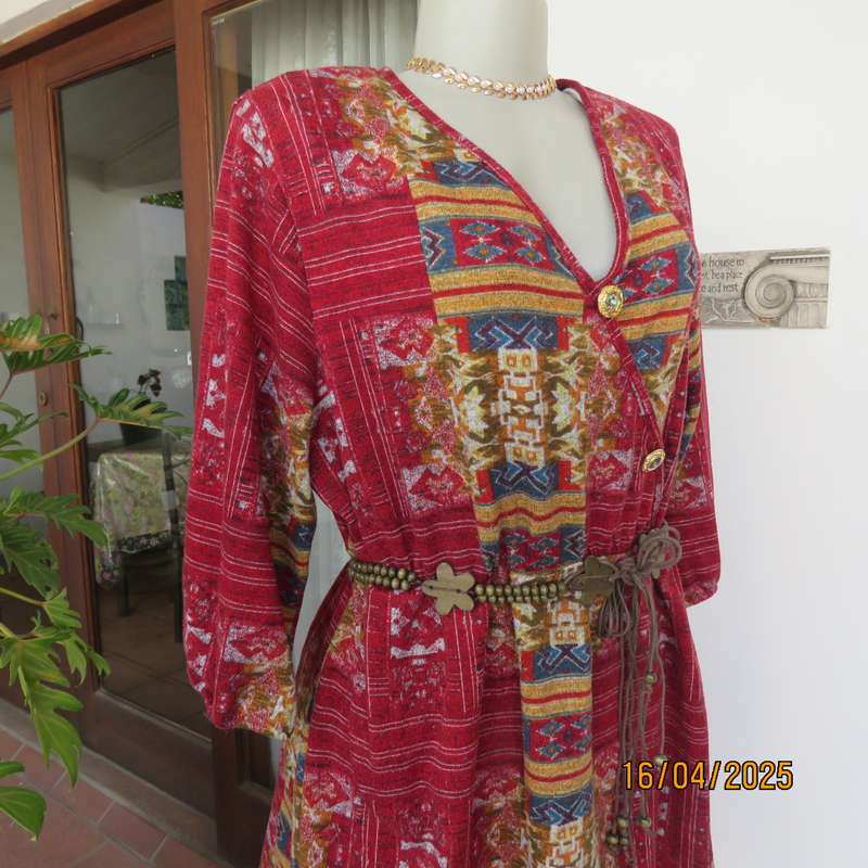 Warm peplum style stretch polyester crimson red geometric print top size 40 to 42.