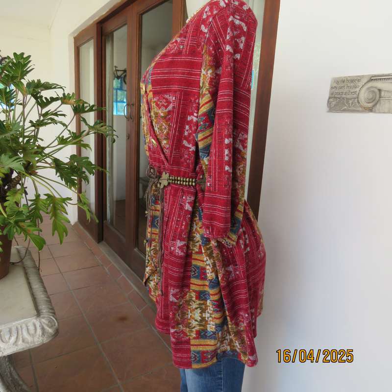 Warm peplum style stretch polyester crimson red geometric print top size 40 to 42.