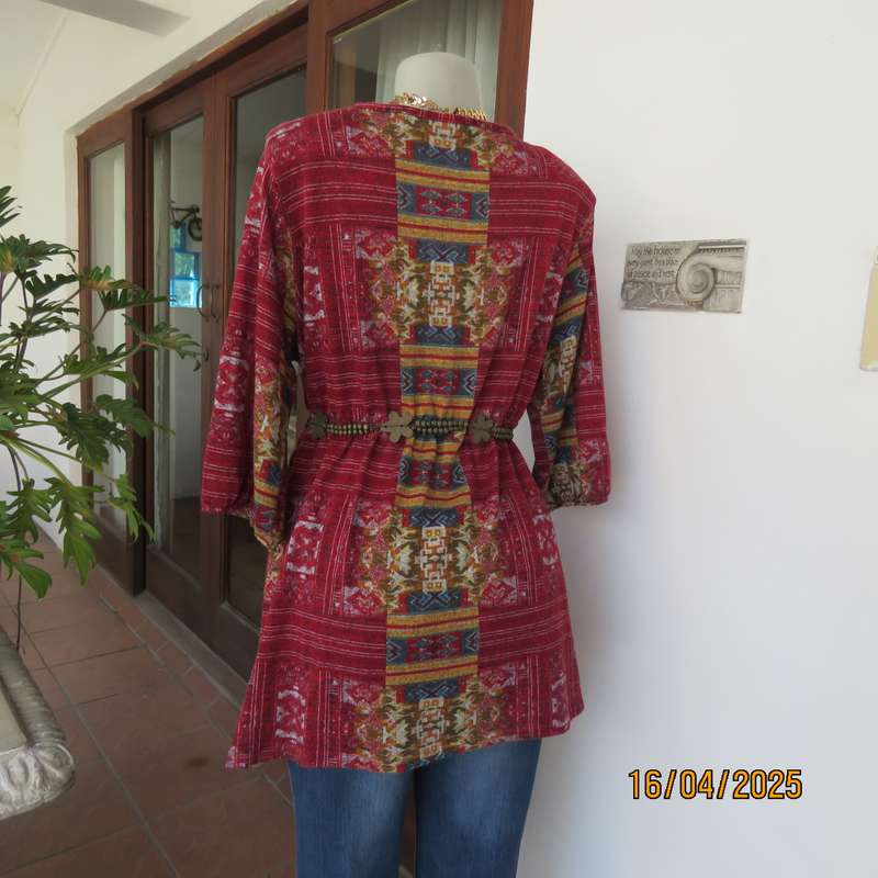 Warm peplum style stretch polyester crimson red geometric print top size 40 to 42.