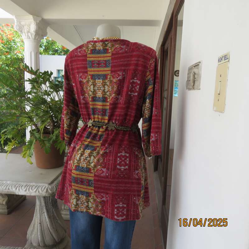 Warm peplum style stretch polyester crimson red geometric print top size 40 to 42.