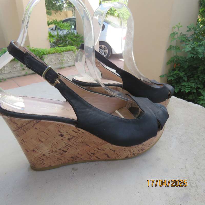 Black faux leather open toe sandals with cork wedge heels size 8. Good Cond.
