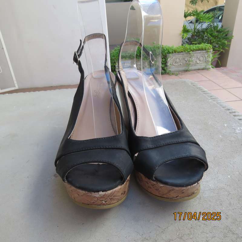 Black faux leather open toe sandals with cork wedge heels size 8. Good Cond.