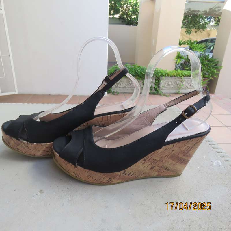 Black faux leather open toe sandals with cork wedge heels size 8. Good Cond.