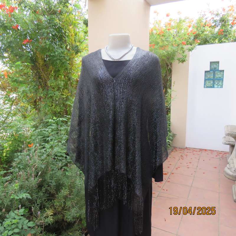 Luxury black polyester throw with silver thread with V front. New item