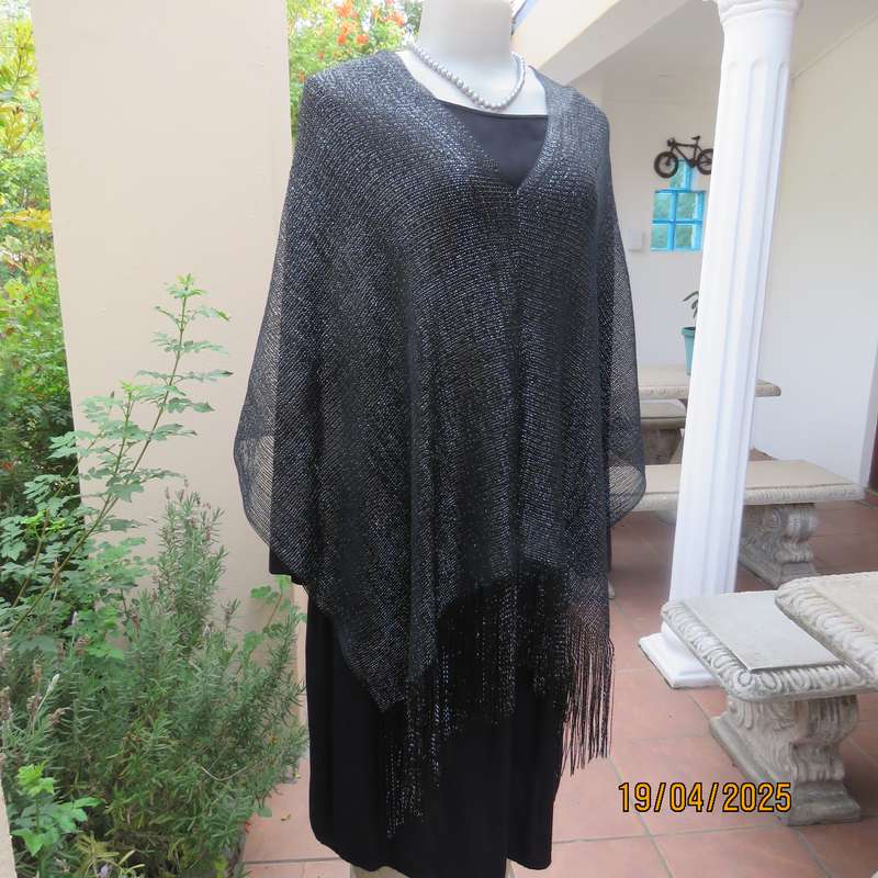 Luxury black polyester throw with silver thread with V front. New item