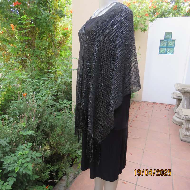 Luxury black polyester throw with silver thread with V front. New item