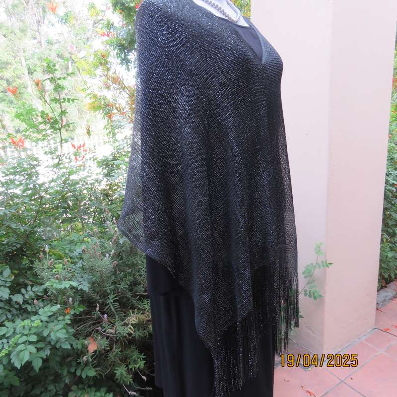 Luxury black polyester throw with silver thread with V front. New item