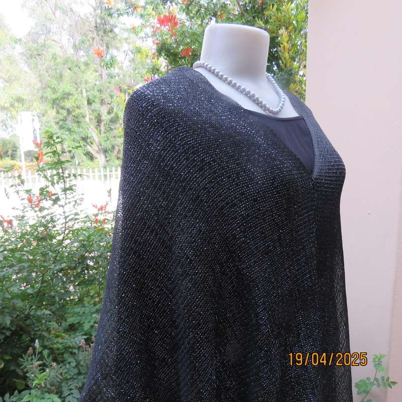 Luxury black polyester throw with silver thread with V front. New item