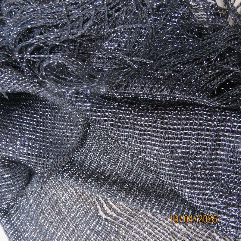 Luxury black polyester throw with silver thread with V front. New item