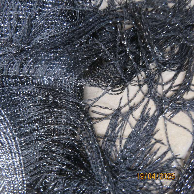 Luxury black polyester throw with silver thread with V front. New item