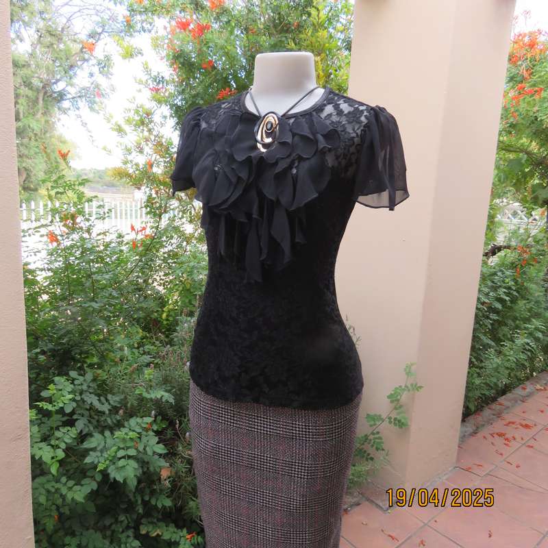OASIS black acrylic lace and stretch polyester bell sleeve top. Size 34