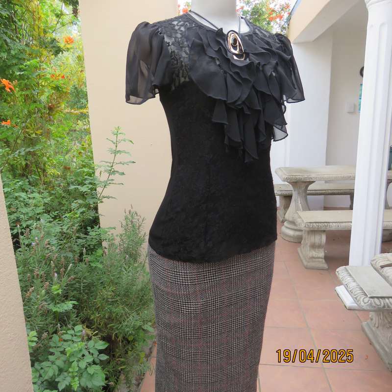 OASIS black acrylic lace and stretch polyester bell sleeve top. Size 34