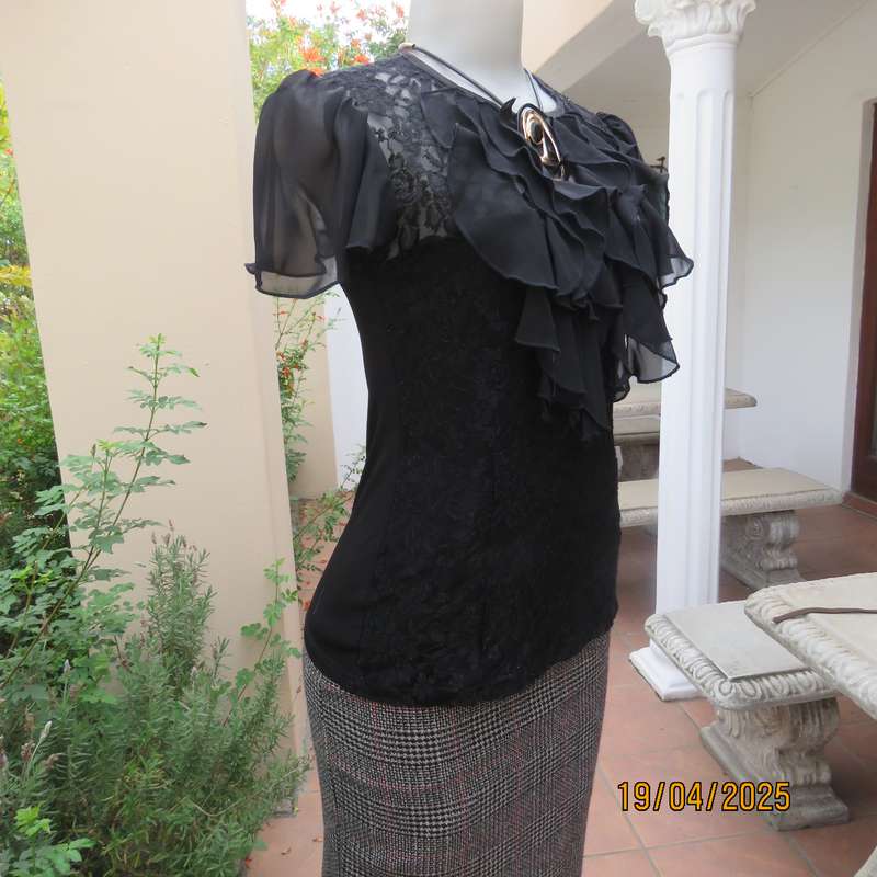 OASIS black acrylic lace and stretch polyester bell sleeve top. Size 34