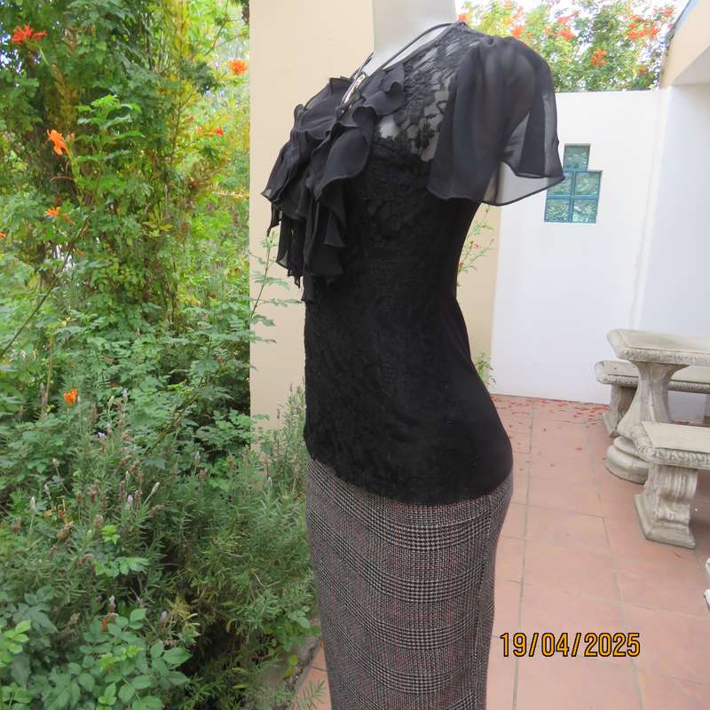 OASIS black acrylic lace and stretch polyester bell sleeve top. Size 34