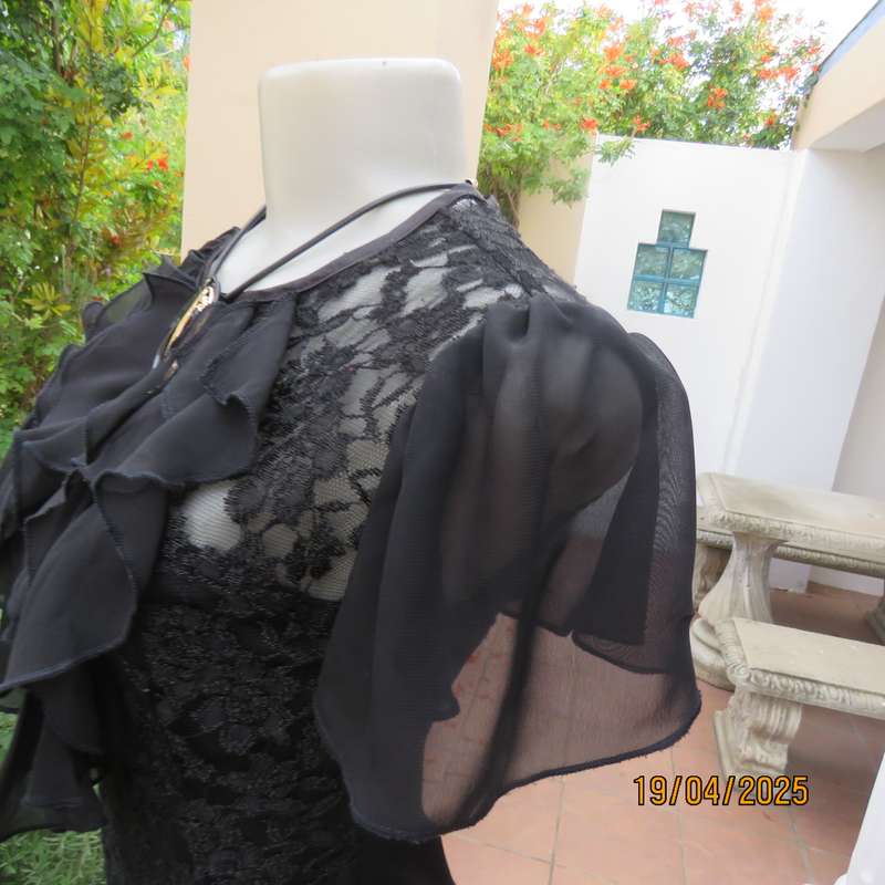 OASIS black acrylic lace and stretch polyester bell sleeve top. Size 34