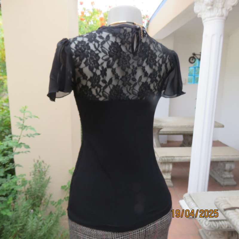 OASIS black acrylic lace and stretch polyester bell sleeve top. Size 34