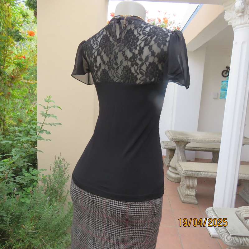OASIS black acrylic lace and stretch polyester bell sleeve top. Size 34