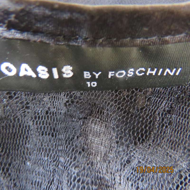 OASIS black acrylic lace and stretch polyester bell sleeve top. Size 34