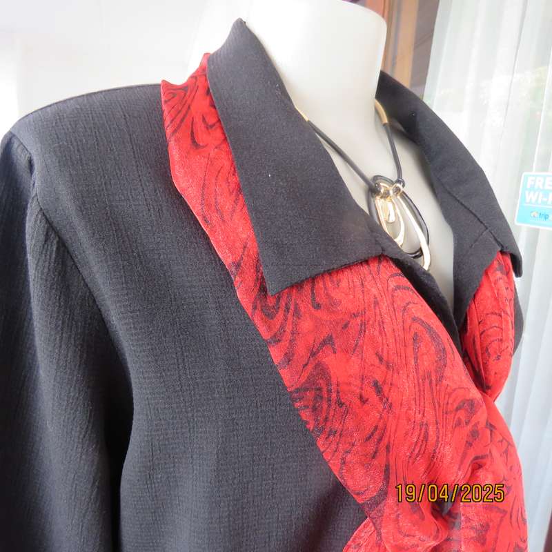 Black long sleeve textured polyester button down top size 42.