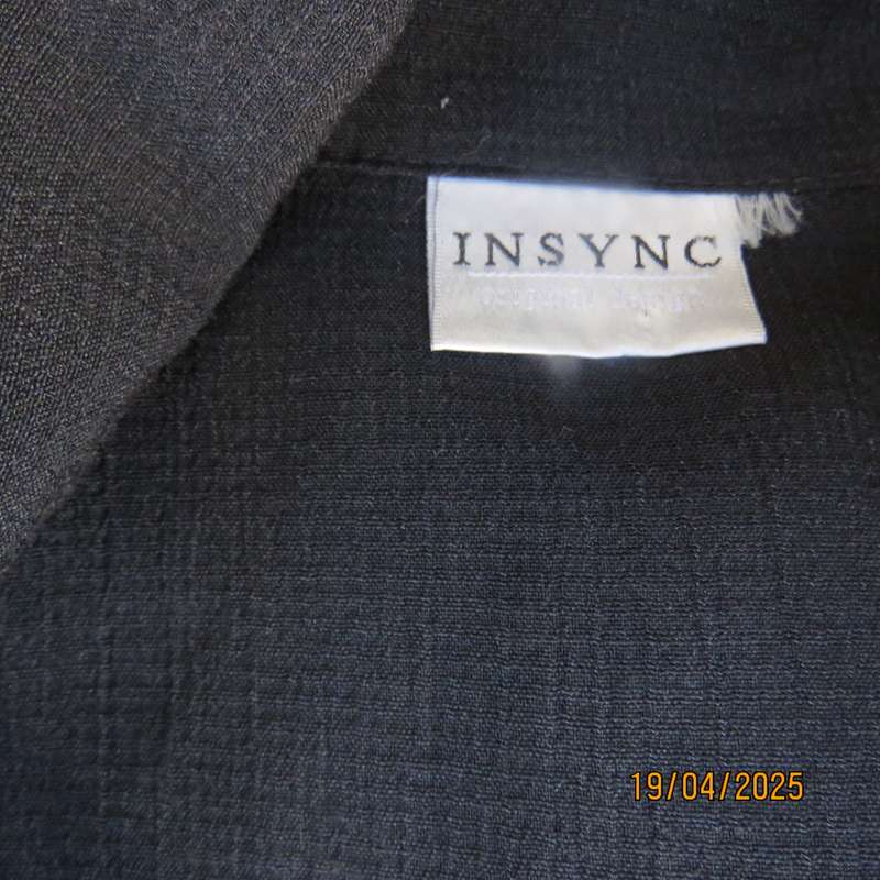 Black long sleeve textured polyester button down top size 42.
