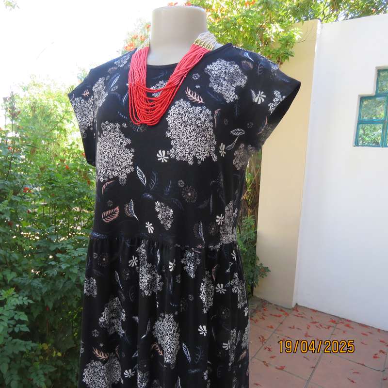 Black very soft stretch polyester with white flowers maternity size 36-38 dress.