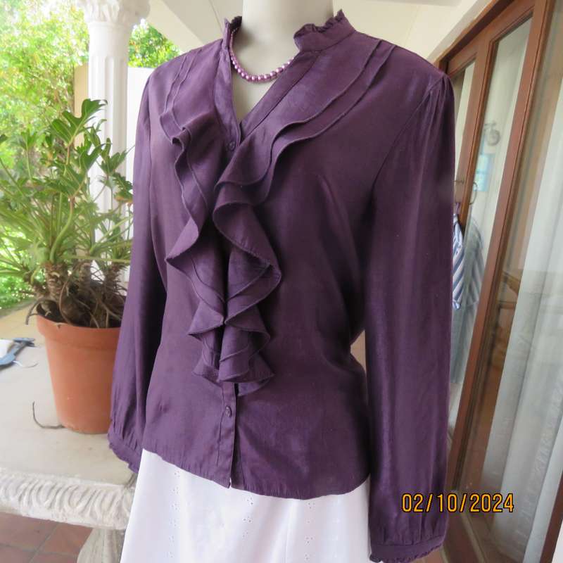 Smart shiny dark purple long sleeve tailored top size 34. V front with banded neckline.As new cond.