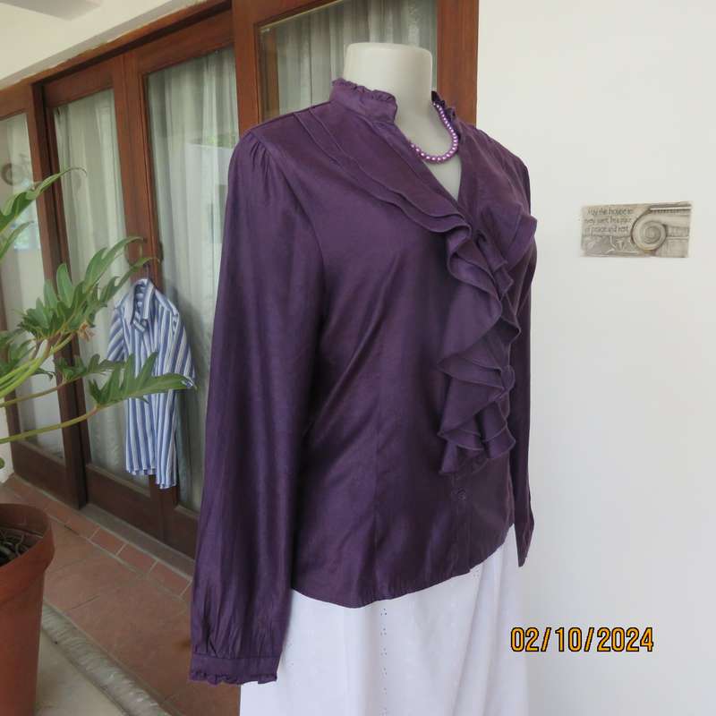 Smart shiny dark purple long sleeve tailored top size 34. V front with banded neckline.As new cond.