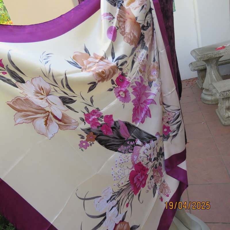 Stunning 90 x 90 square scarf in silky polyester. Rich cream with violet frame and flowers.