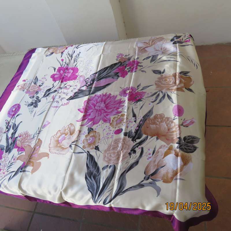 Stunning 90 x 90 square scarf in silky polyester. Rich cream with violet frame and flowers.