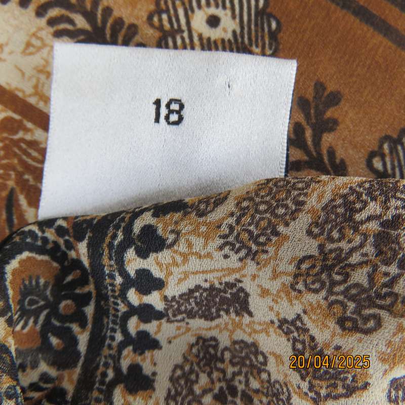 DONNA CLAIRE sheer polyester long top in brown-cream-black bo-ho print. Size 42