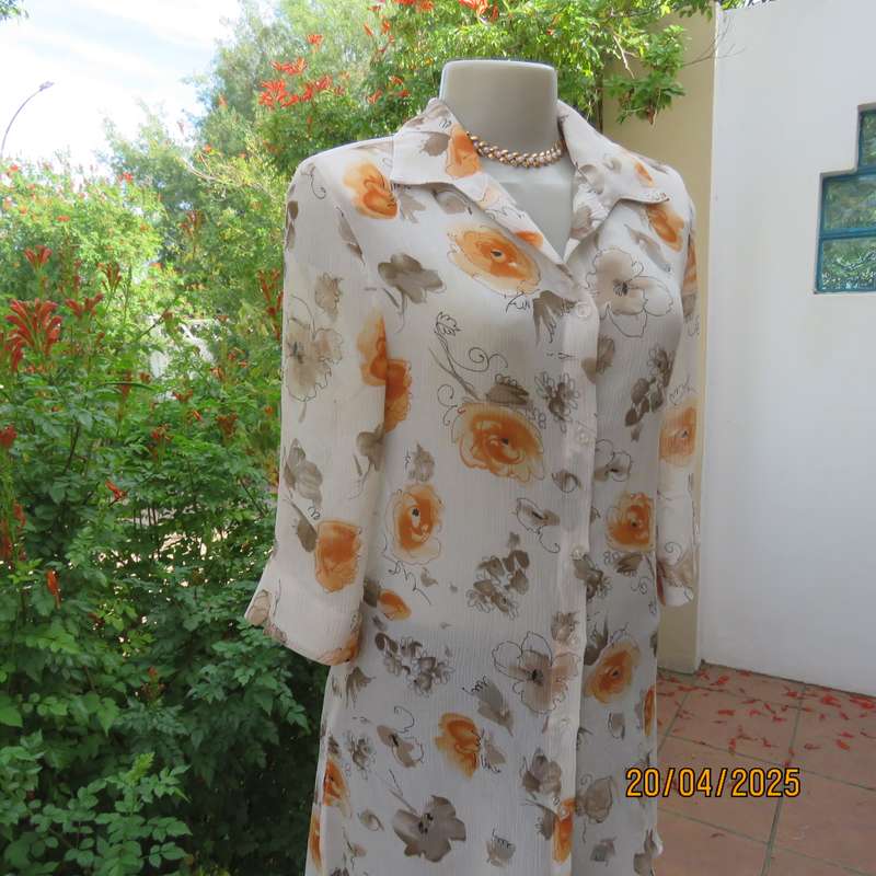 ZOEY long button down crinkled polyester top with open collar. Cream-orange flowers. Size 34