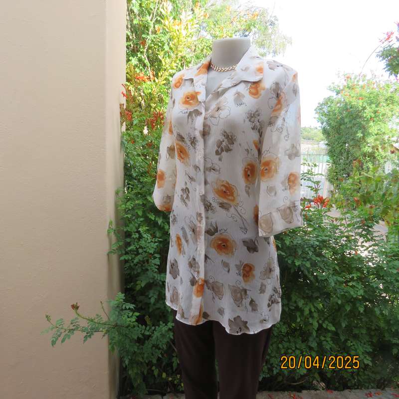 ZOEY long button down crinkled polyester top with open collar. Cream-orange flowers. Size 34