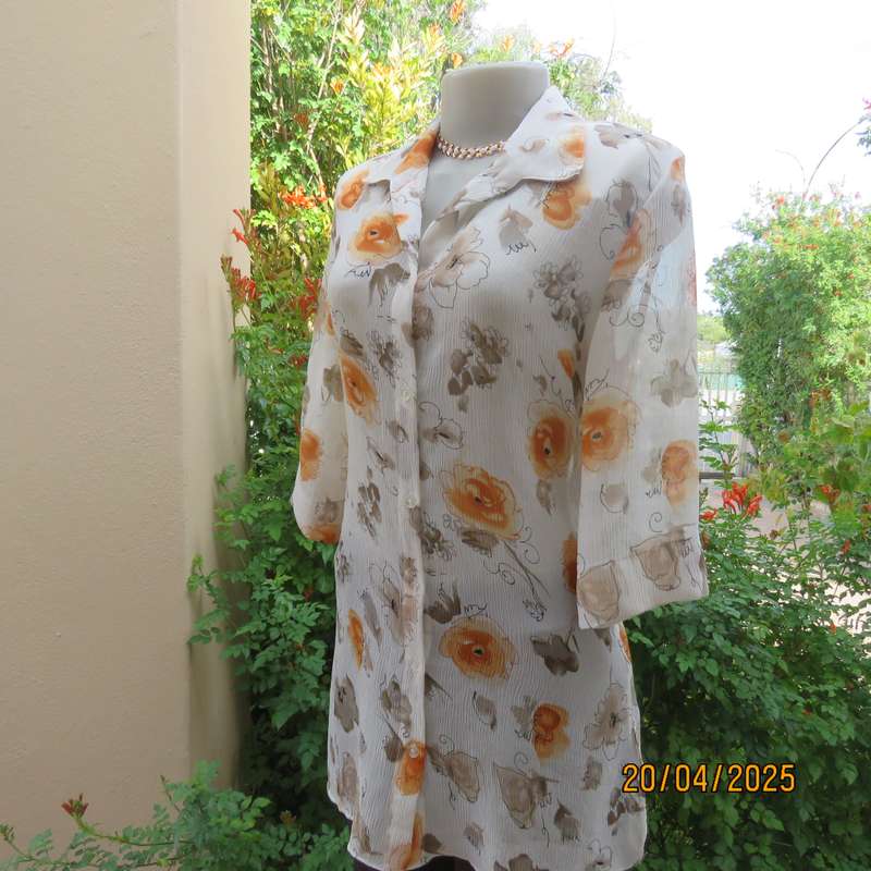 ZOEY long button down crinkled polyester top with open collar. Cream-orange flowers. Size 34