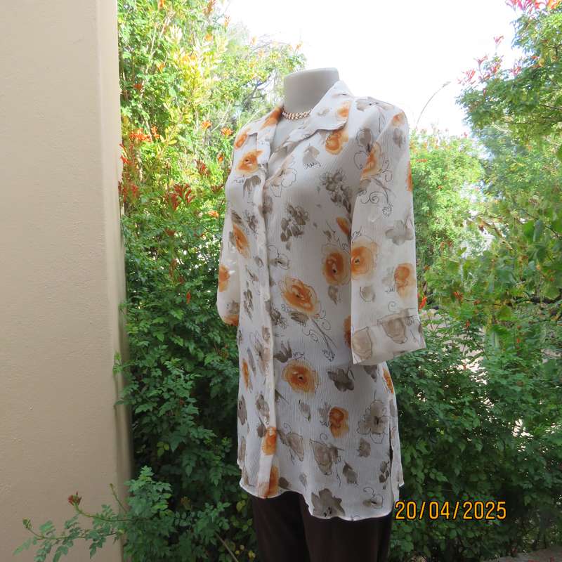 ZOEY long button down crinkled polyester top with open collar. Cream-orange flowers. Size 34