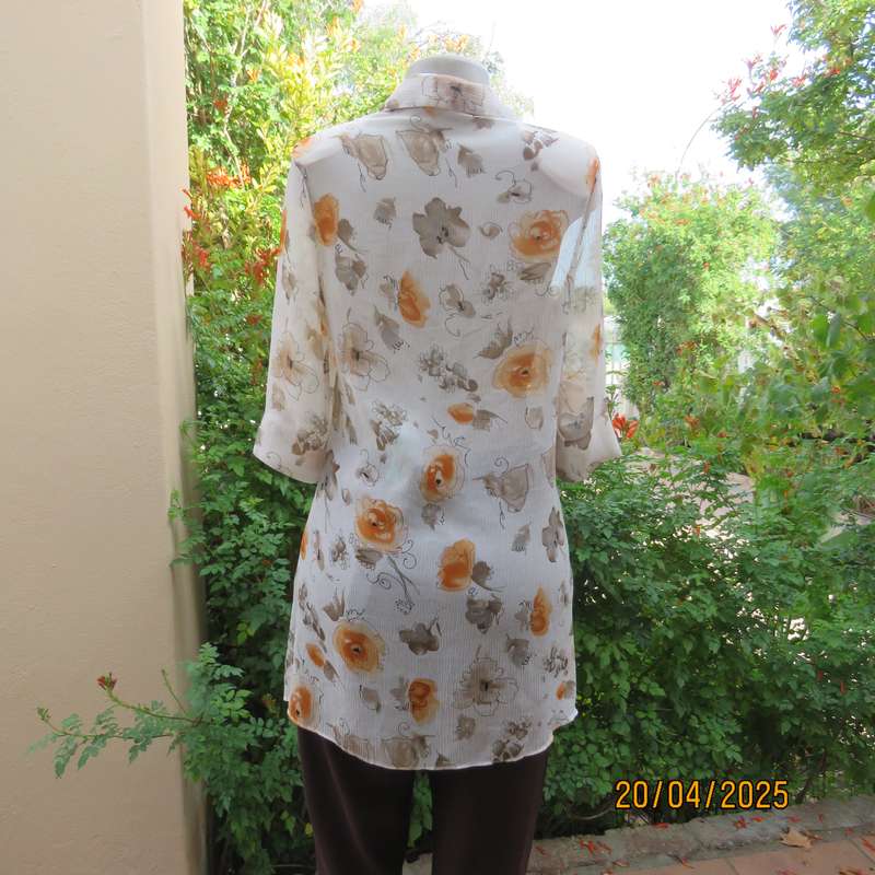 ZOEY long button down crinkled polyester top with open collar. Cream-orange flowers. Size 34