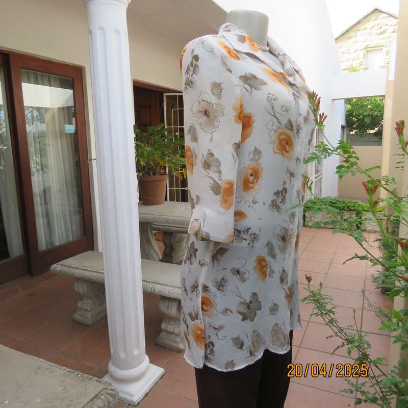 ZOEY long button down crinkled polyester top with open collar. Cream-orange flowers. Size 34