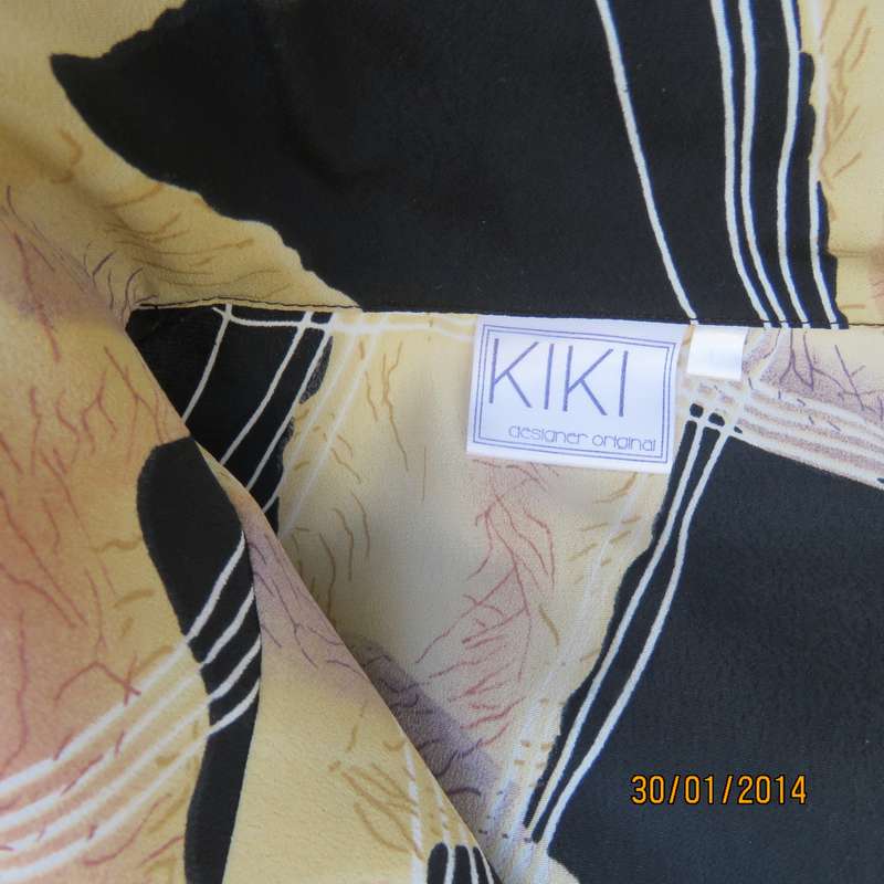 KIKI designer geometric printed black-cream button down top. Hint of peach. As new.