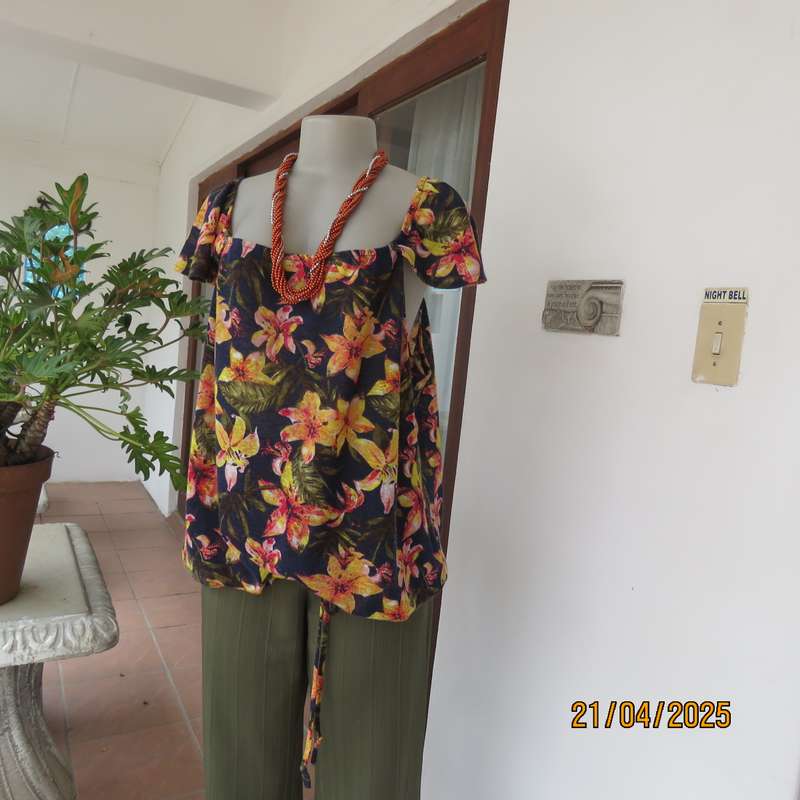 Navy off the shoulder polyester top with yellow-orange lilies. Size 44