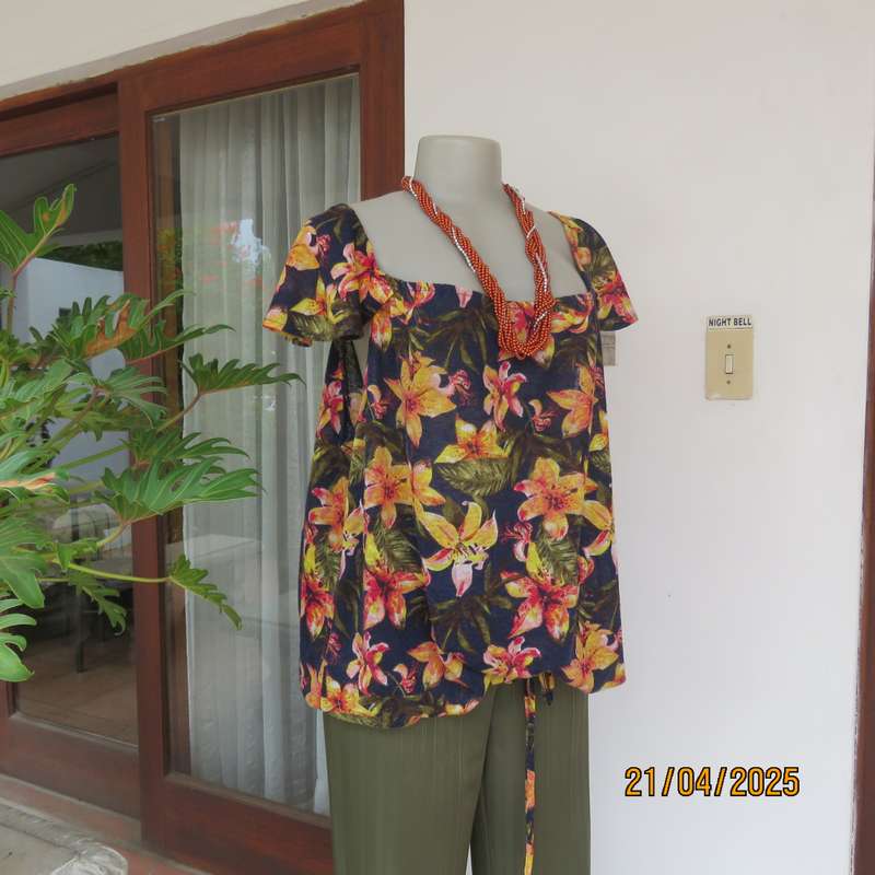 Navy off the shoulder polyester top with yellow-orange lilies. Size 44