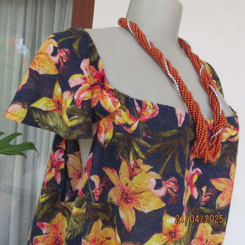Navy off the shoulder polyester top with yellow-orange lilies. Size 44