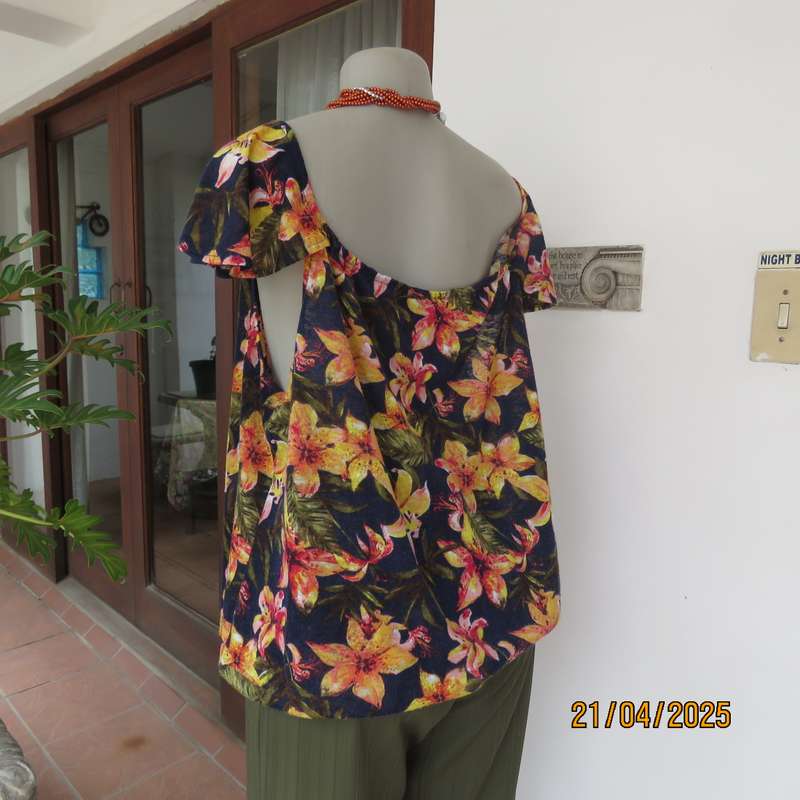 Navy off the shoulder polyester top with yellow-orange lilies. Size 44