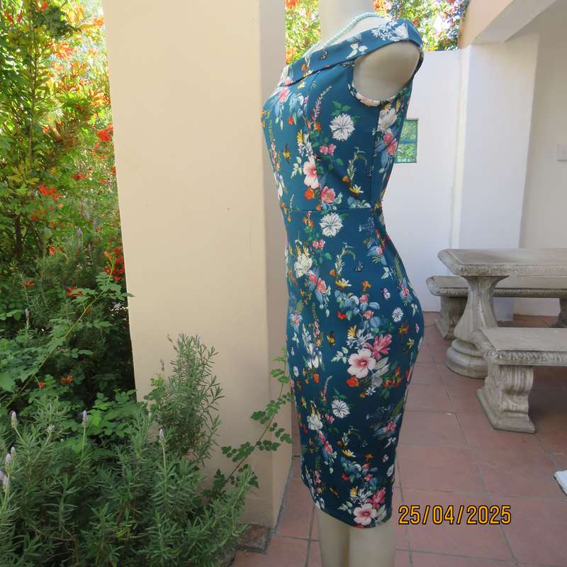 MISS L dark jade heavy stretch polyester stretch bodycon size 32 dress with floral pattern.