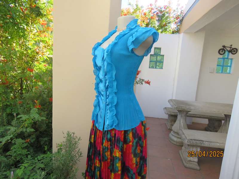 FORME teal blue permanent pleated top. Satin front inlay with frills. Size 36-38