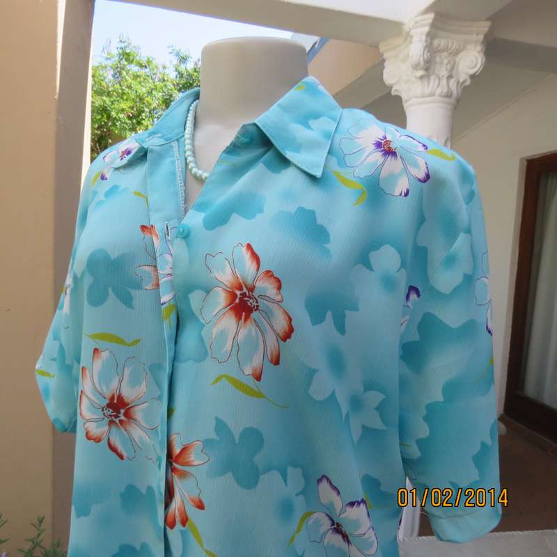 Cheerful smart short sleeve button down top in array of turquoise. Purple-orange flowers,Size 40.