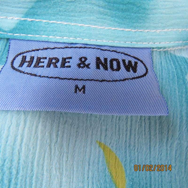 Cheerful smart short sleeve button down top in array of turquoise. Purple-orange flowers,Size 40.