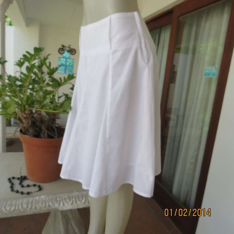 As new white gored skirt with wide yoked waistband.Zip at size. Size 36 by IMAGE.2Layers polycotton.