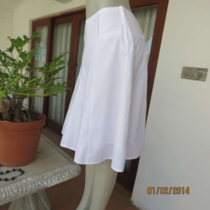 As new white gored skirt with wide yoked waistband.Zip at size. Size 36 by IMAGE.2Layers polycotton.
