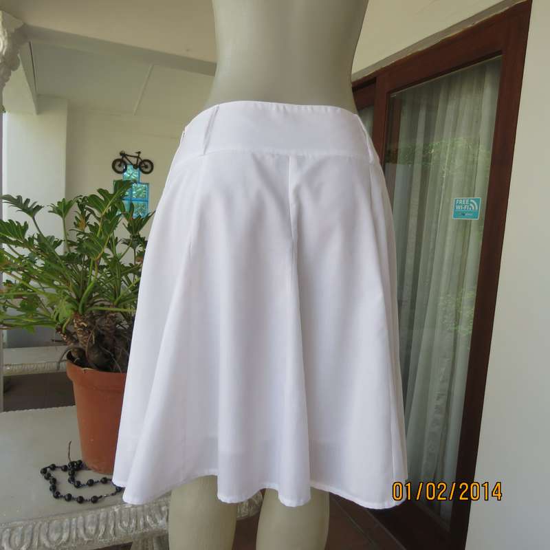 As new white gored skirt with wide yoked waistband.Zip at size. Size 36 by IMAGE.2Layers polycotton.